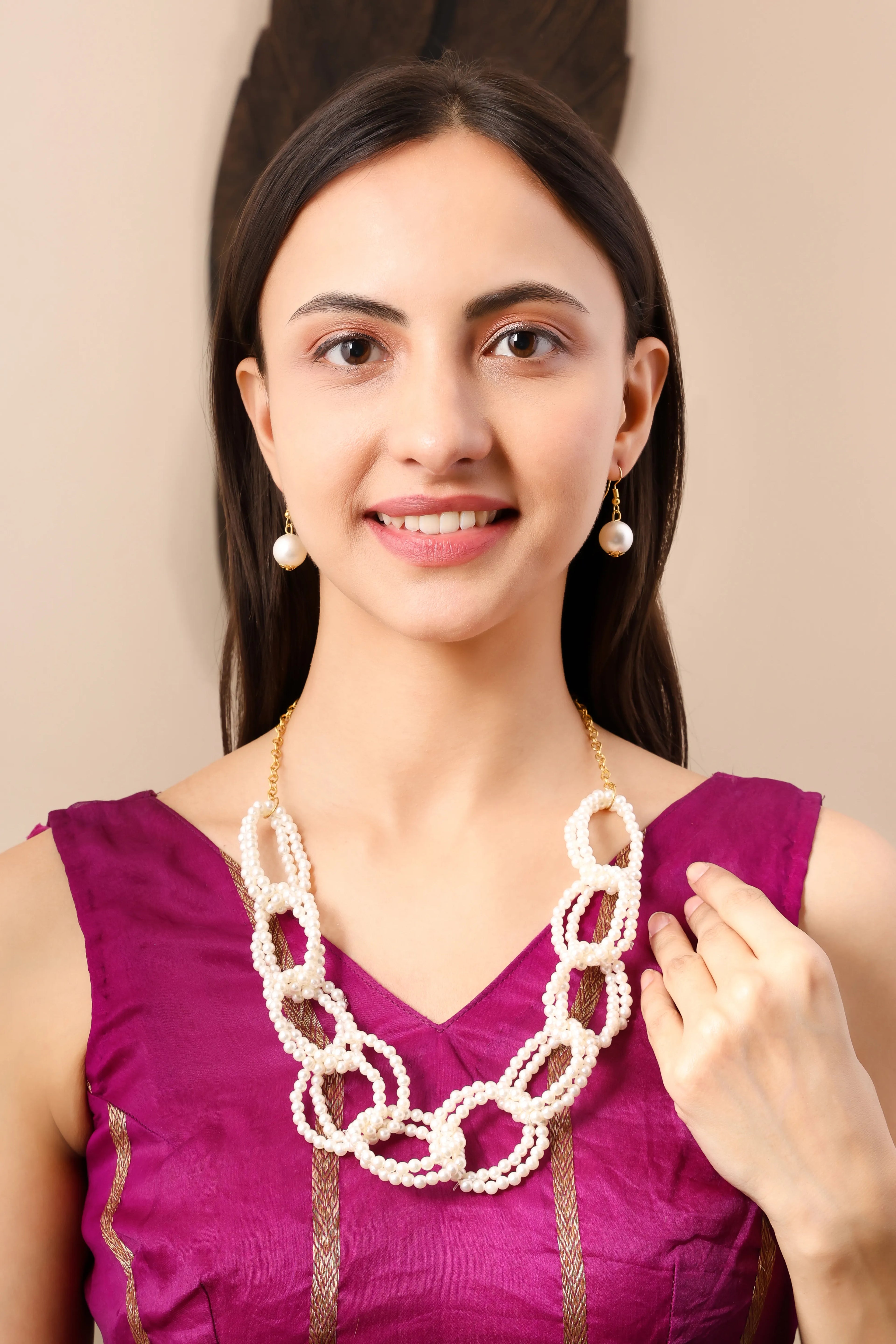 looped pearl choker necklace with matching earrings