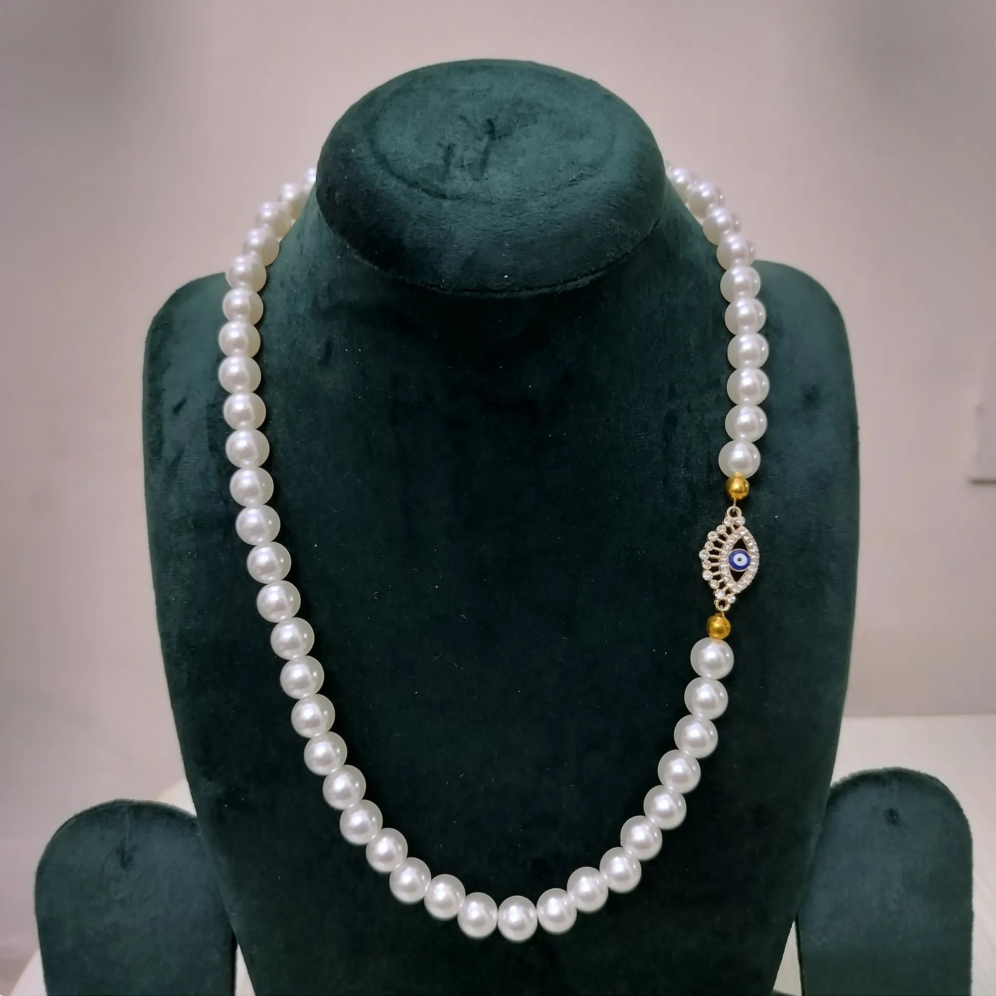 Classic Pearl Necklace with Golden Evil Eye Charm